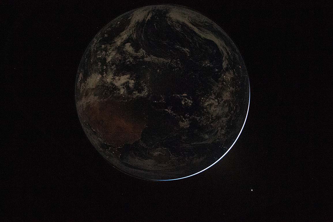 Earth seen from Artemis II after translunar injection burn