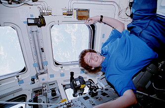 Helms onboard Space Shuttle